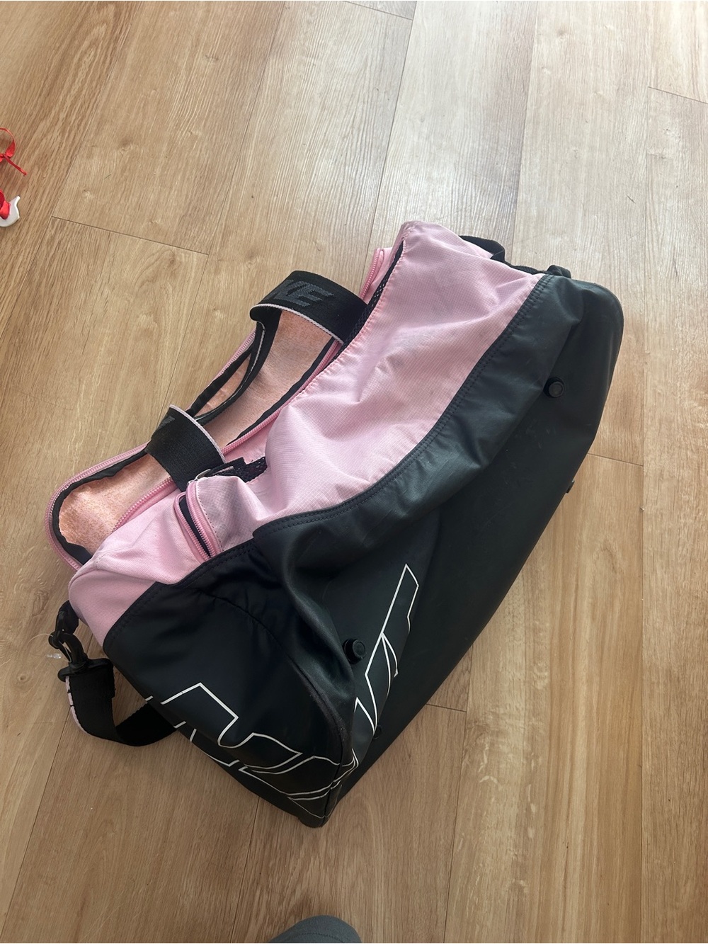 Pink and Black Nike Duffel Bag -